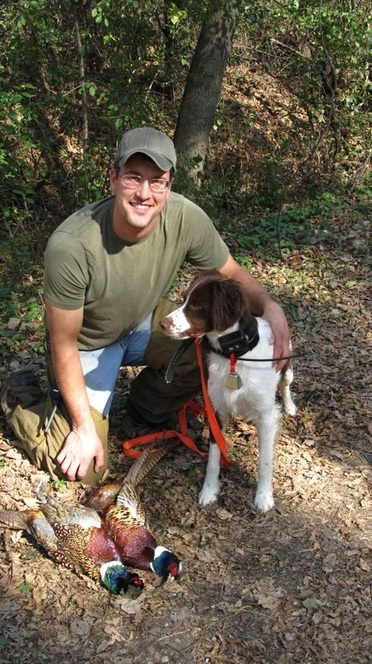 Ch. Schonhund Winning Wager and co-owner Noah Wollenburg with a pheasant double during the 2011 hunting season